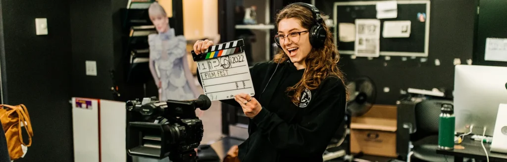 A student director behind the camera in the PCTV studio