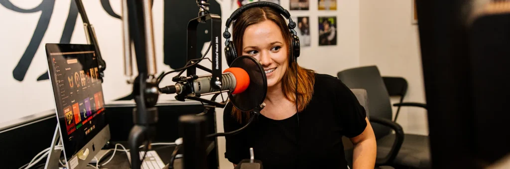 A student DJ in the WDOM radio station